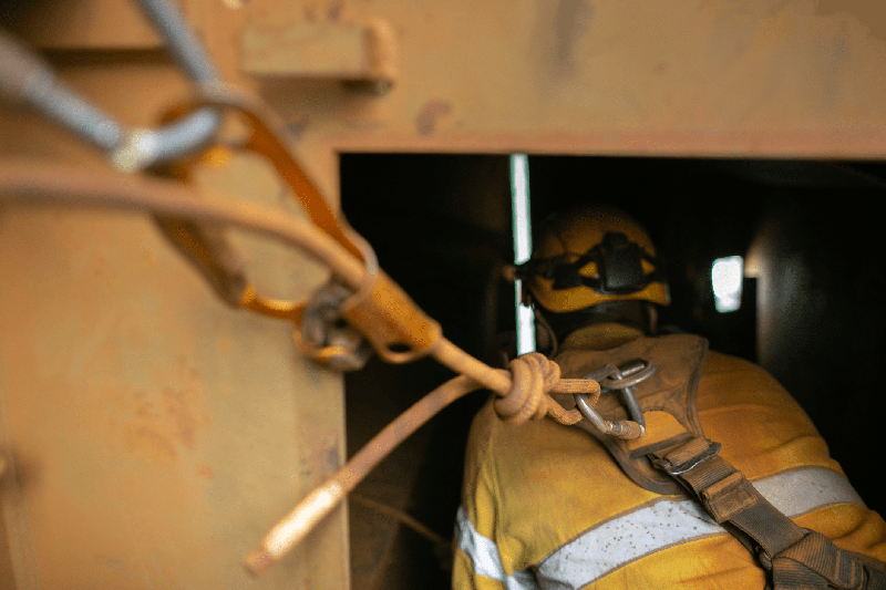 firefighting-course-man-entering-space-with-pulley-behind