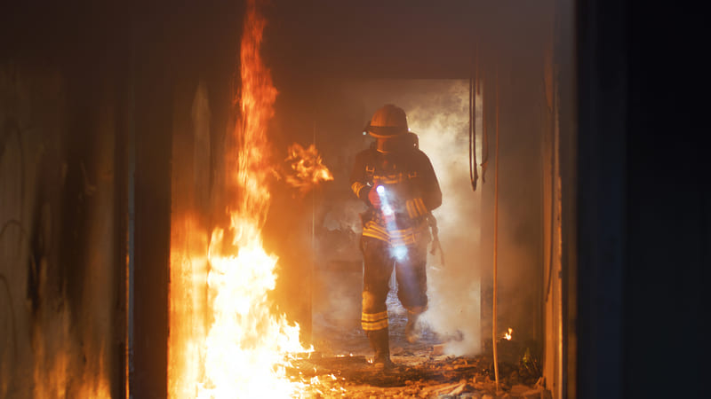 fire-fighter-course-fireman-running-through-buirning-building