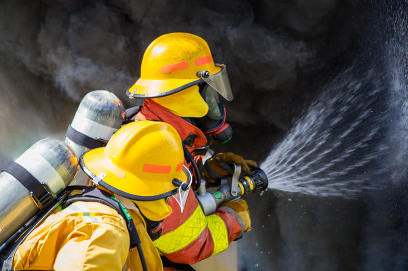 fire-fighting-course-two-firefighters-water-spray