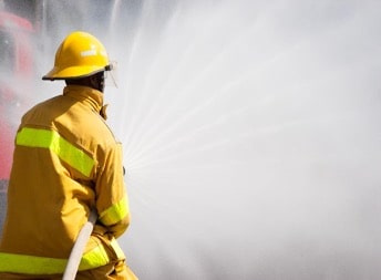 fire-fighting-training-firefighter-spraying-hose