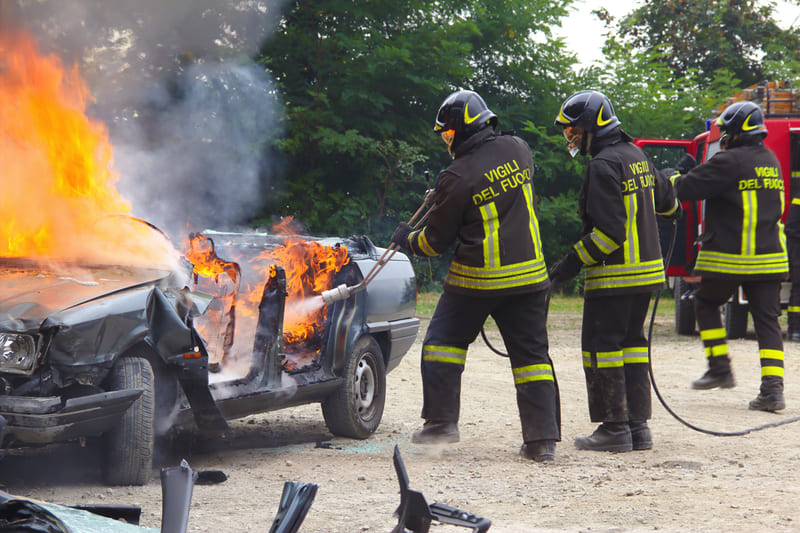 fire-fighting-training-firefighters-extinguishing-car-on-fire