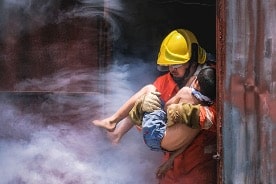 fire-fighting-training-man-holding-boy