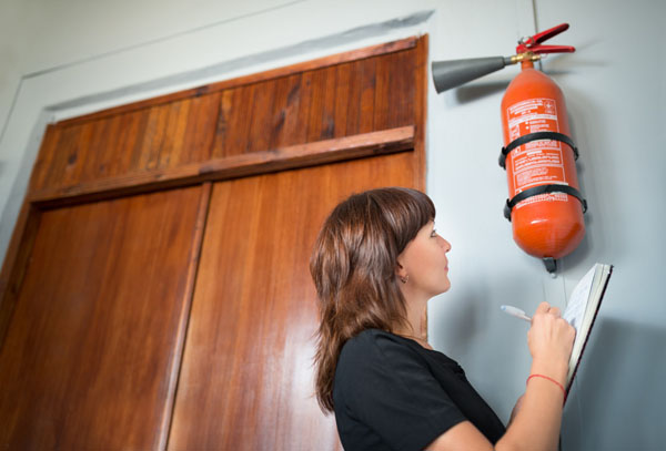 firefighting-course-woman-does-inspection