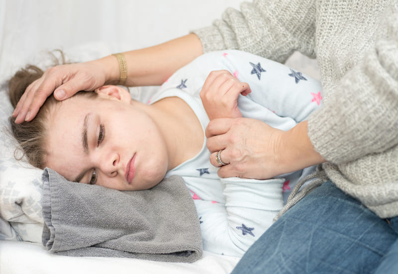 first-aid-training-a-child-with-epilepsy-during-a-seizure