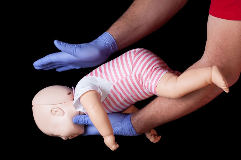 first-aid-training-baby-choking-back-blow-medical-help