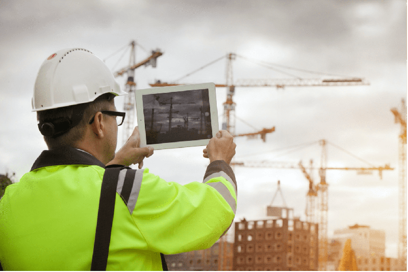 Health-and-safety-training-man-taking-photo-cranes