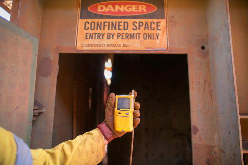 saftey-officer-course-worker-hand-holding-gas-test-detector-device-while-commencing-safety-gas