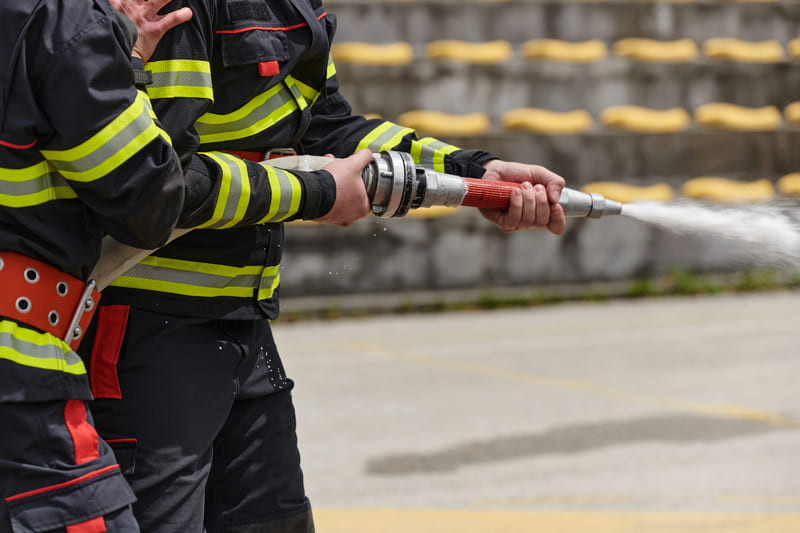 fire-fighting-course-professional-firefighters-training-with-water-hose