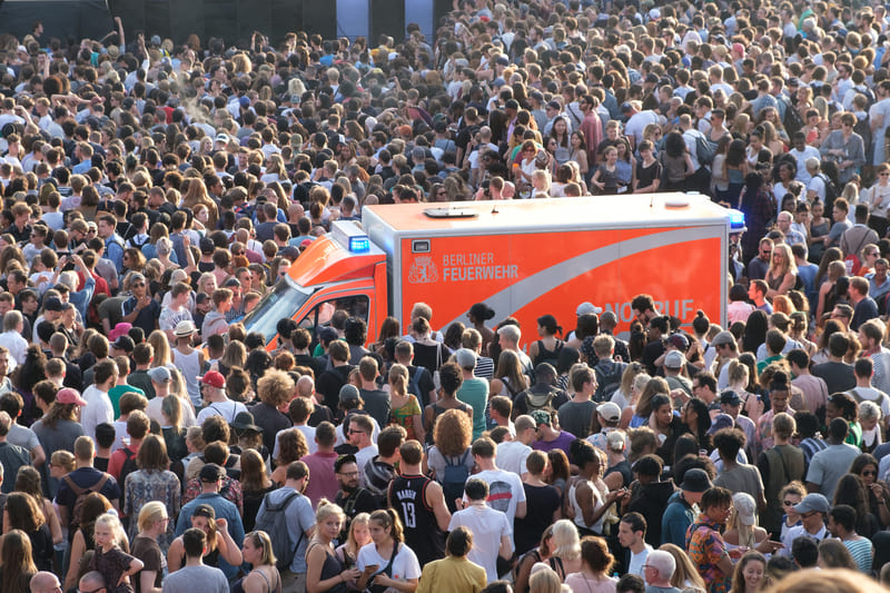 first-aid-training-emergency-transporter-ambulance-inside-crowd-of-people