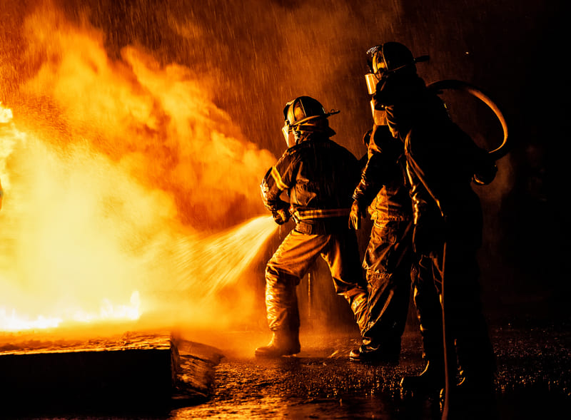 EMCARE - fire fighting training - firefighters working together